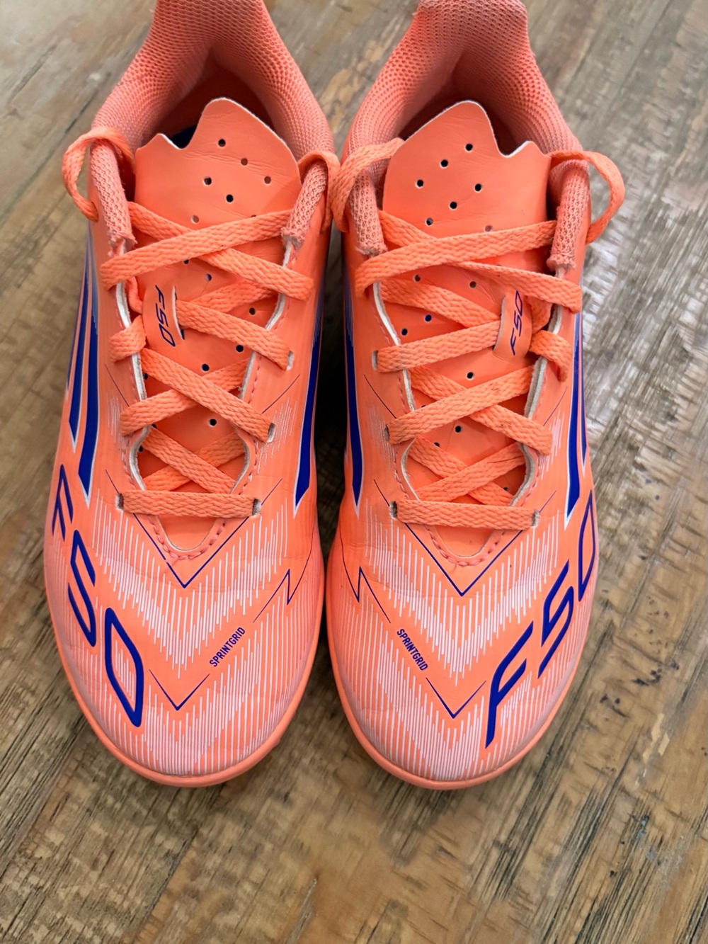 adidas F50 Kids Soccer Cleats in Bright Orange with Blue Accents Size 2
